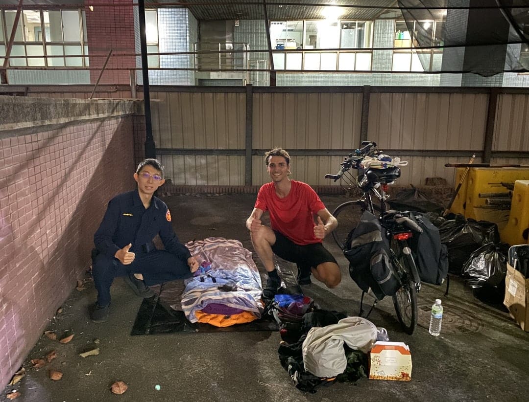 My camp behind the police station and beside the hospital in Chiayi; with Officer Harry
